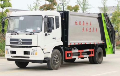 What are the main functions of the compressed garbage truck?